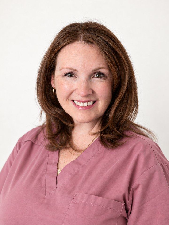 Rebecca, endorsed midwife, in rose scrubs